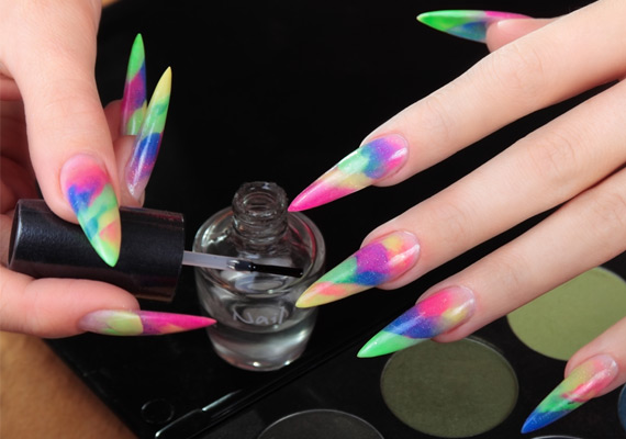 Be creative and place designs or pictures on your nails using different colours.